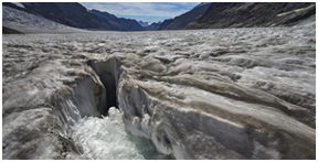 Water runs off a melting glacier in the Swiss Alps (CNS/Denis Balibouse, Reuters)